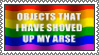 stamp that reads 'objects i have shoved up my arse' on a rainbow flag